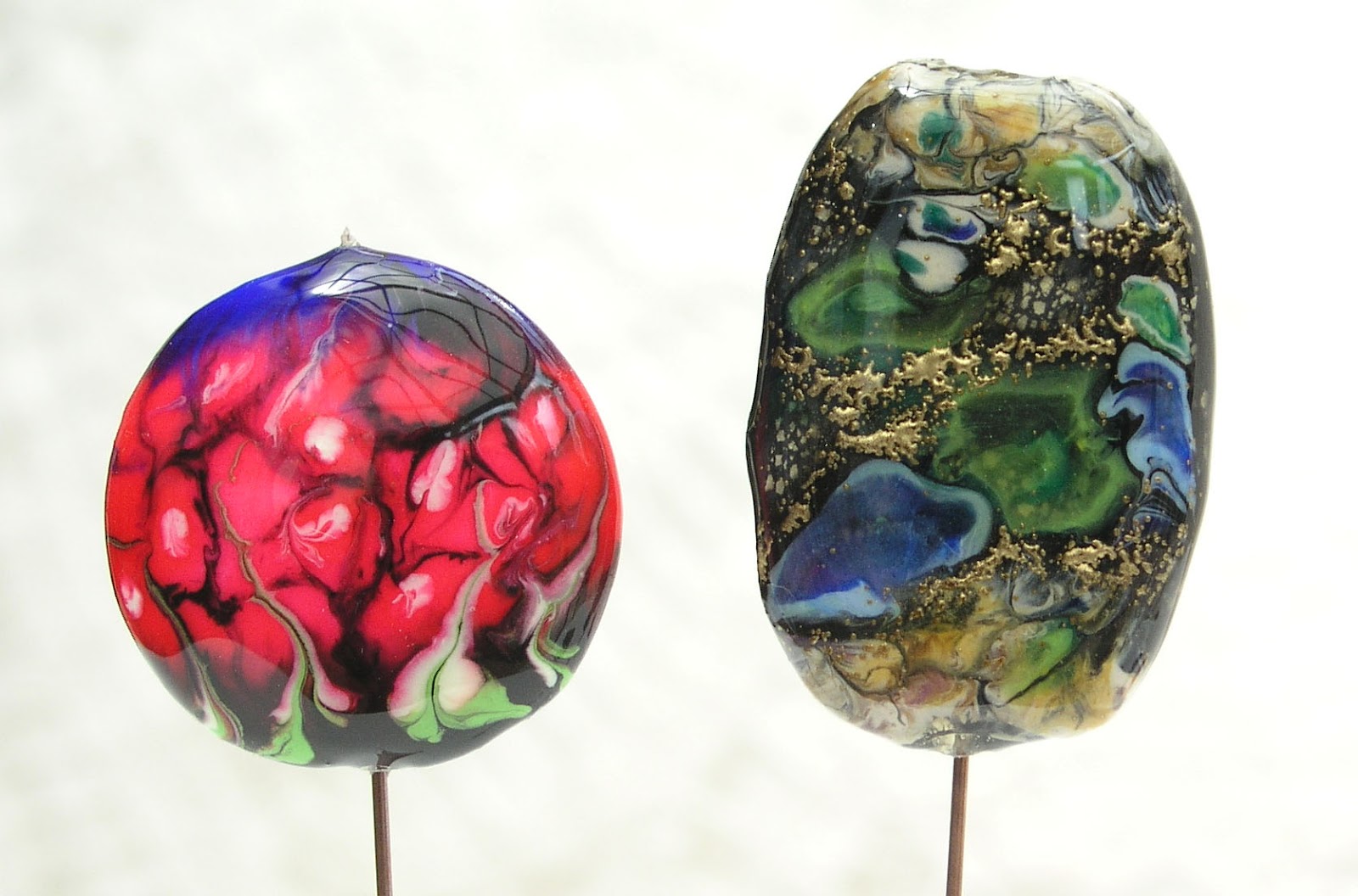 Caroline Fung A few of my faux lampwork polymer clay beads