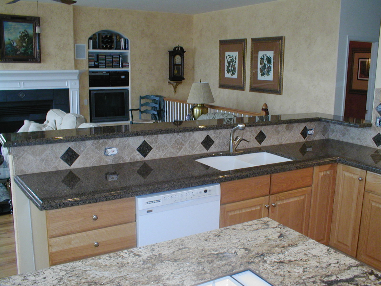 Integrity Installations A division of Front Range Backsplash: 4x4 Tumbled 