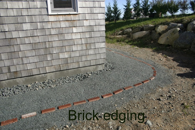 A pathway is created with crusher dust &  the FREE brick edging makes for a nice touch.