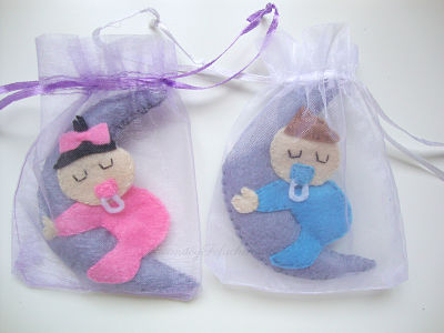 bebes dormidos en fieltro con empaquetado para bautizo