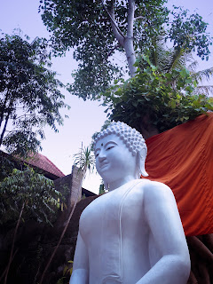 Potrait of White Buddha Statue Under The Bodhi Tree At Brahmavihara Arama Monastery North Bali