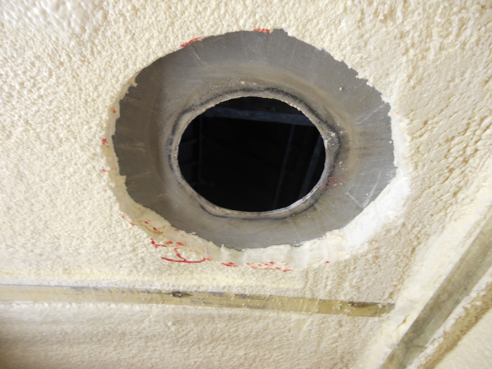 Harris & Watson Narrowboat Build Insulation cut back around stove