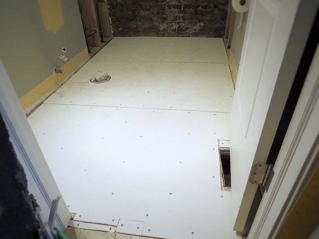 laying cement board on floor