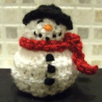 https://www.lovecrochet.com/snowman-chocolate-cover-decoration-crochet-pattern-by-kippers-ning