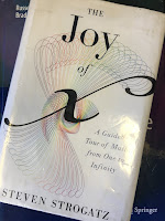 The Joy of X,  by Steven Strogatz, superimposed on Intermediate Physics for Medicine and Biology.