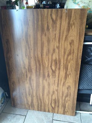 I took the back panel off. There were a zillion staples