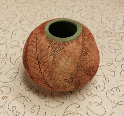 Beautiful unique leaf imprint ceramic pottery hand thrown vessel - in progress.
