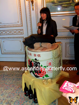 Translator in front of ceremonial drum, Sake + Urushi of Northern Japan, 2013 Ninohe City Fair in New York City