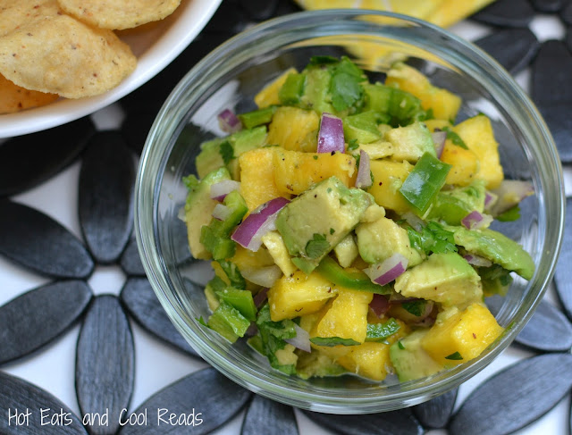 A fresh and delicious combo of sweet and savory flavors! Great with chips or a topper for shrimp, chicken or fish! The perfect addition to any Mexican themed meal! Pineapple Avocado Salsa Recipe from Hot Eats and Cool Reads!