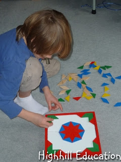 child playing a math game on the floor