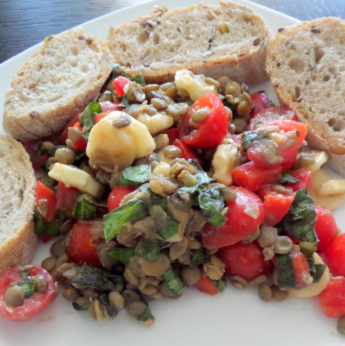 Lentil Caprese Salad:  A lentil salad with tomatoes, mozzarella, and basil tossed in a balsamic vinaigrette. It's great as a side or a light lunch.