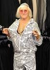 Jimmy Savile in white sweat suit