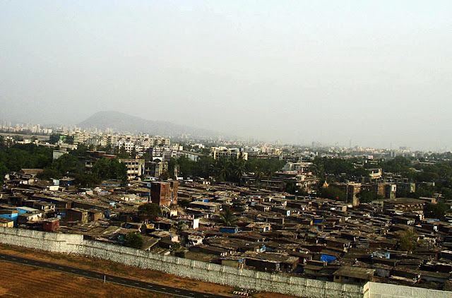 slums adjoining airport runaway