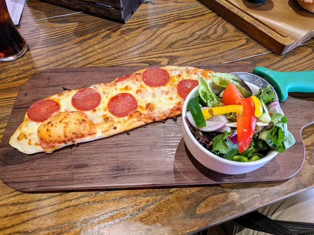 Where to eat in Chester UK: Pizza and salad at Music Tap Hall
