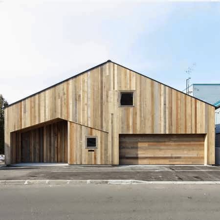 Sapporo Wooden House Design with a Timber Exterior and an Interior Divided By a Series of Wooden