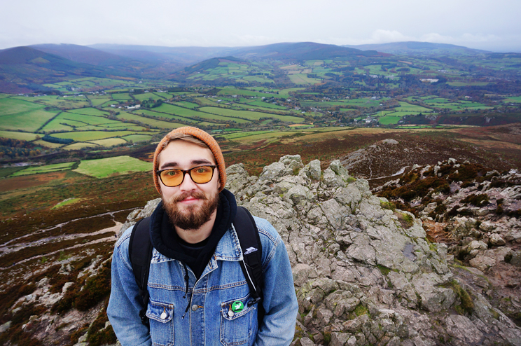 A happy boyfriend at the top