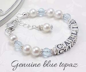 baby bracelet in cultured pearls with blue topaz birthstones