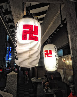 Swastika at Buddhist Shrine in Dontonburi area, Osaka, Japan. Photo by Sydney Solis