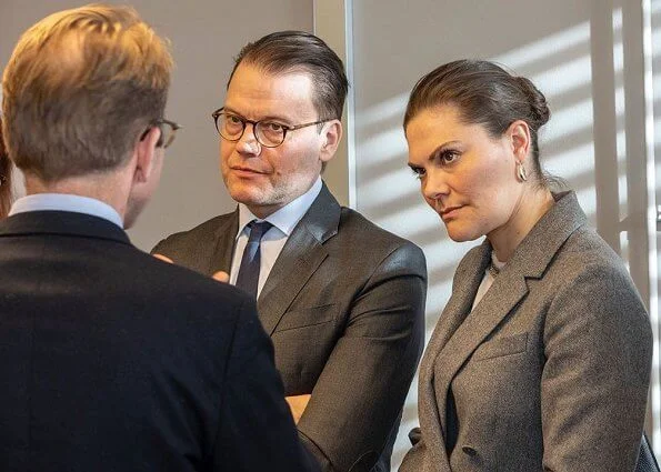 Crown Princess Victoria wore ERDEM X H and M wool suit. Tiger of Sweden top. Meghan Markle and Prince Harry
