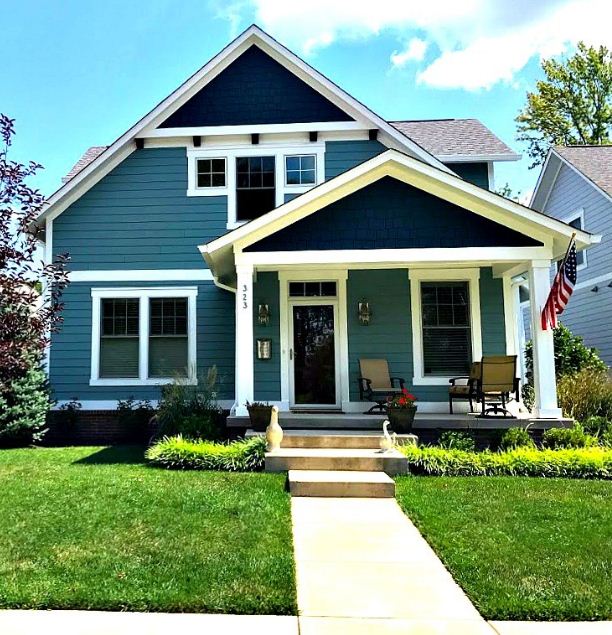 Creative Small House Exterior Paint Design with Simple Decor
