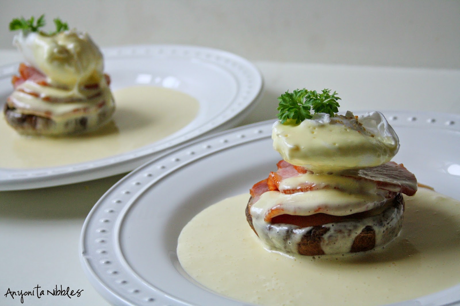 She used grilled portabellos to replace the brioche or English muffins in this eggs Benedict dish and make it gluten free from Anyonita Nibbles