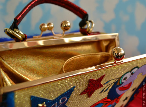 Irregular Choice Muppets Daredevil bag open open bag with gold metallic lining and clasp closure