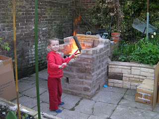 lighting a garden bonfire with aftershave using the new bonfire for the first time