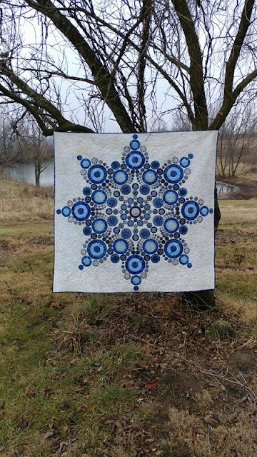Flurry quilt pattern by Slice of Pi Quilts; Modern snowflake quilt using Island Batik Alpine Ice fabrics