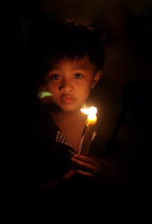 Kid holding a candle - LIfe is beautiful