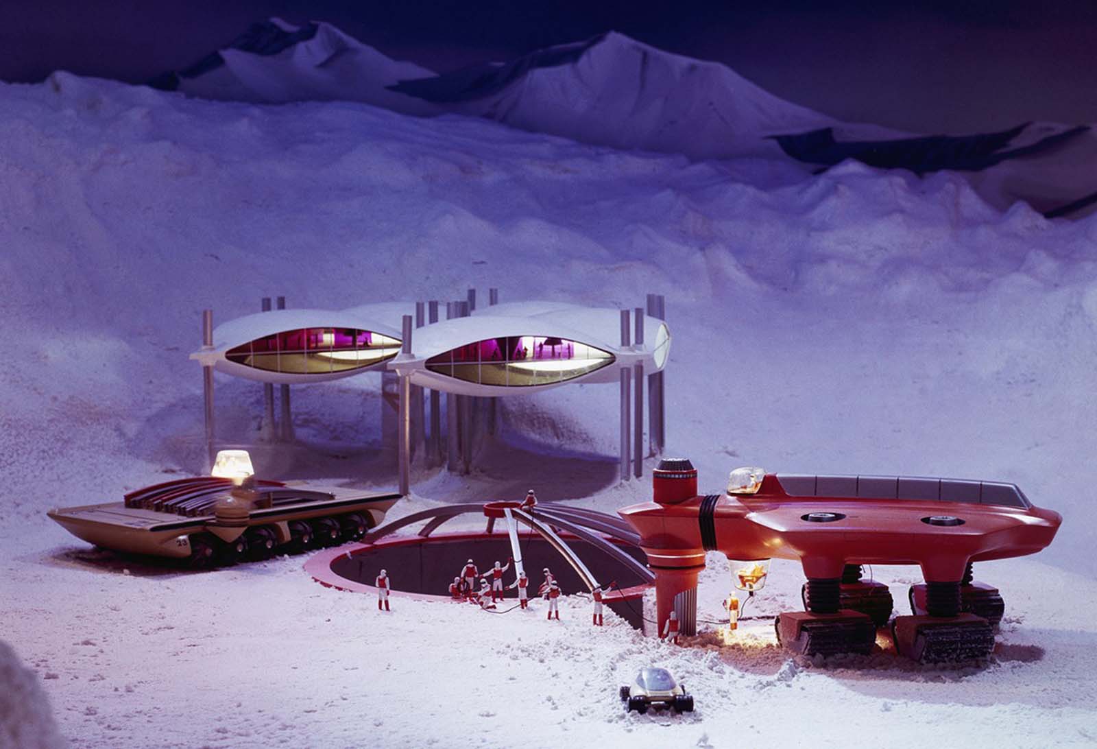 A model of a deep hole cut into Antarctic ice, leading to a weather station, where technicians can prepare forecasts embracing whole continents, part of GM's Futurama exhibit at the World's Fair.
