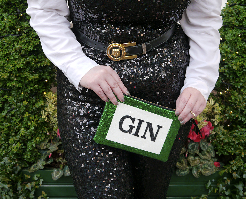 Statement Clutch Bag styled by, styled by helen, Christmas party outfit, party outfit, sequined outfit, sequined jumpsuit, glitter clutch bag, party clutch bag, SoS15, gin bag, gin clutch bag, festive party outfit inspiration, black sequined jumpsuit, catsuit, faux tuxedo style, scottish blogger, fashion blogger style, Edinburgh blogger, red head, Spex Pistol glasses, statement glasess, shop small, London designer, UK designer, independent designer UK, statement bag