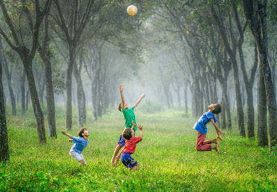 Group of Children Playing Outdoors