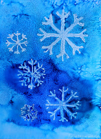 winter watercolor resist art with free printable snowflake template