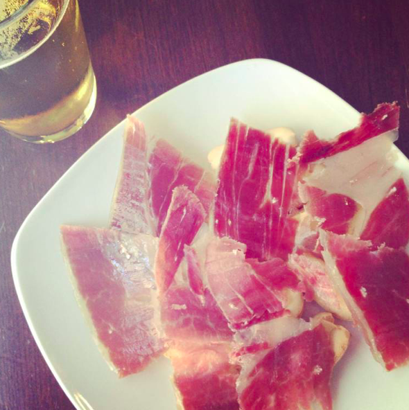 plate of jamon pieces at taberna aguilas in seville