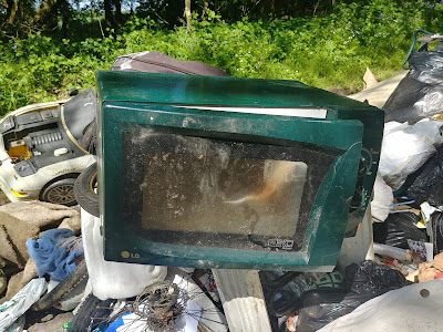 Photograph of fly-tipping on Bradmore Lane, May 7, 2018 Image by North Mymms News released under Creative Commons BY-NC-SA 4.0