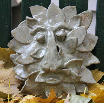 glazed sculpted clay tree face