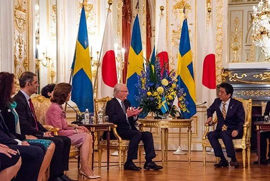 King Carl XVI Gustaf, Queen Silvia, Prime Minister Shinzo Abe and his wife Akie Abe at Akasaka Palace. Queen Silvia and Japanese Princess Takamado