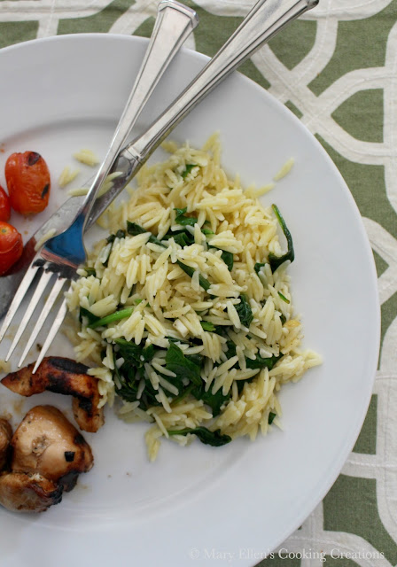 A quick and easy side dish - Lemon Garlic Orzo with Baby Spinach. Bright, zesty lemon with fresh garlic and fresh spinach. 