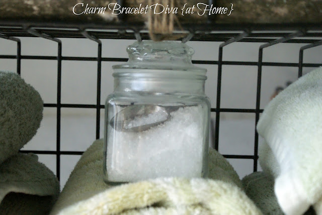 vintage apothecary lidded jar epsom salts silver scoop towels