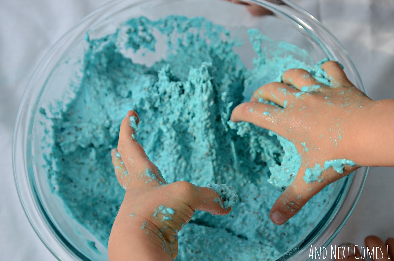 Edible sludge sensory play from And Next Comes L