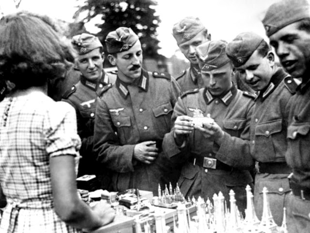 29 October 1940 worldwartwo.filminspector.com Paris shopgirl Wehrmacht soldiers