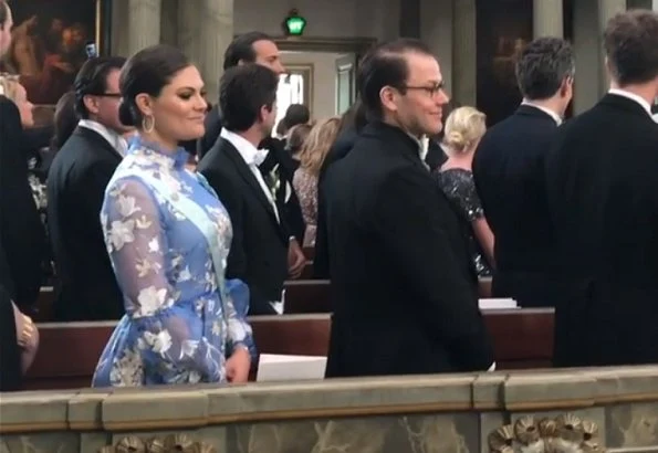Crown Princess Victoria wore Cassandra dress by ERDEM. Crown Princess Victoria and Daniel attended the wedding of Joen Bonnier and Jessica Crawley
