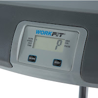 LCD display shows workout stats, located in the centre of the armrest on the desk top of the Exerpeutic WorkFit 1000