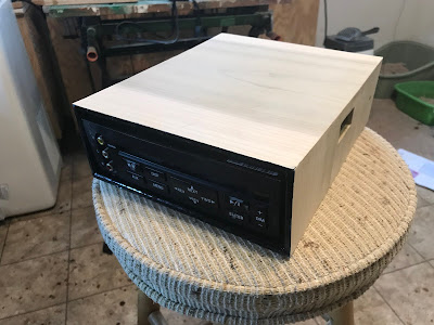 The DVD player in its new case