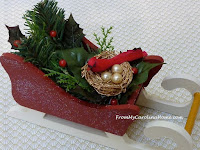 https://frommycarolinahome.wordpress.com/2015/12/03/holiday-crafting-christmas-sleigh/