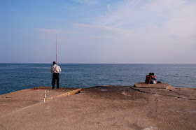 Fisherman and Couple: Bogatell beach, Barcelona