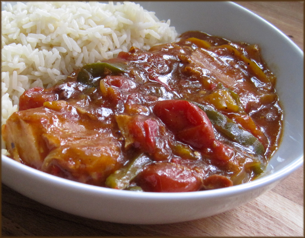 Slow cooker pork recipe. Spicy Pork with Peppers and Tomatoes