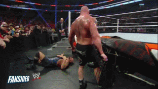 brock-hits-show-with-chair.gif
