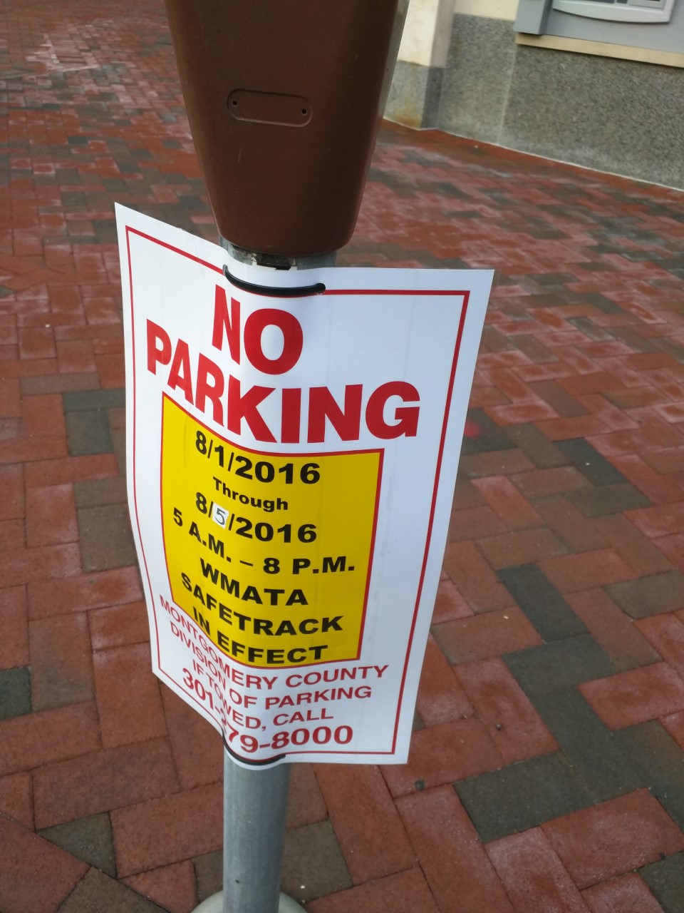Robert Dyer Bethesda Row Signs posted banning parking on Wisconsin