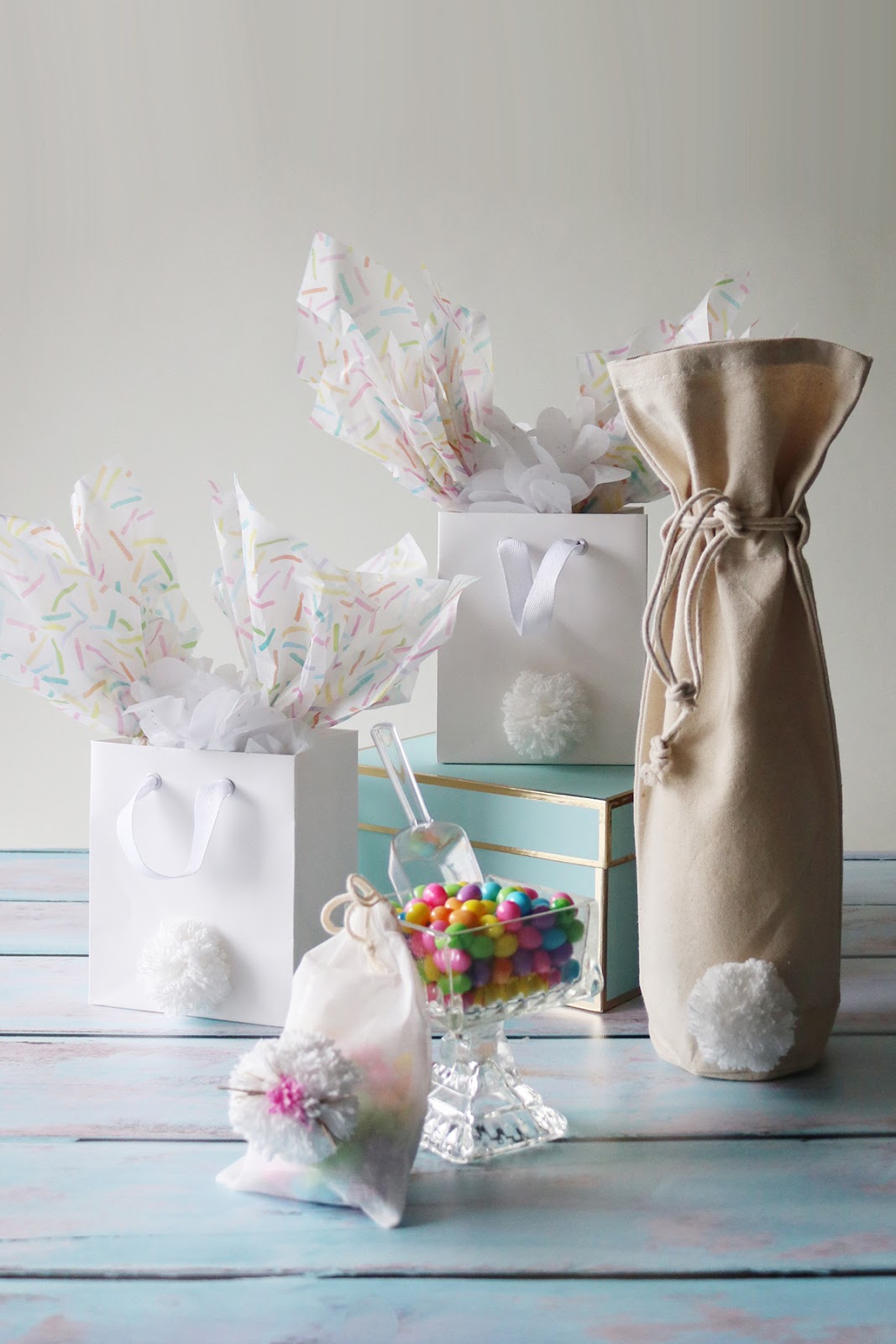 Easter gift bag inspiration - pom poms, tissue paper bunny ears and paper bags | Creative Bag